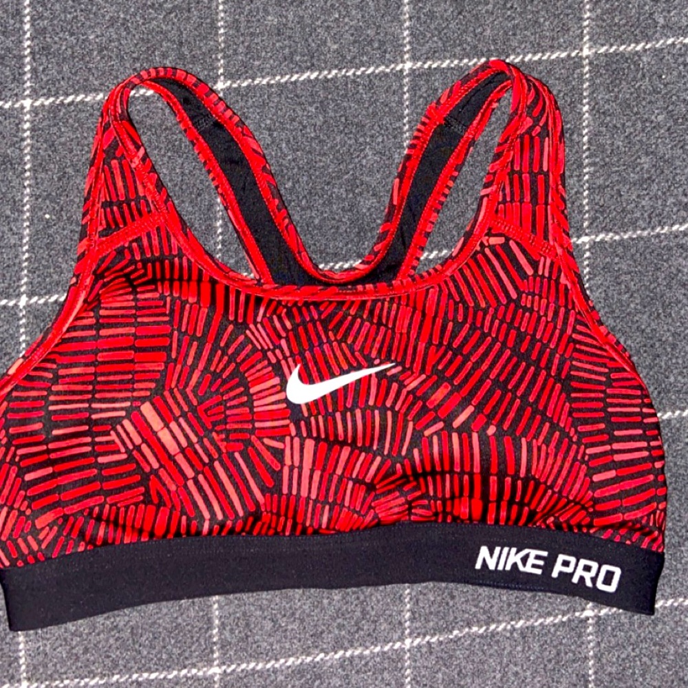 Small red Nike Pro Sorts bra